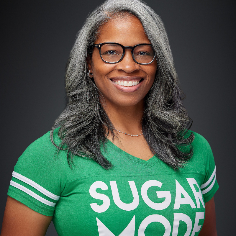 Picture of Kashundra Foreman, founder of Sugar Mode Off in green shirt.